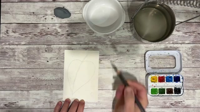 Dessin au crayon de la forme globale de la feuille de Monstera avec placement des trous caractéristiques