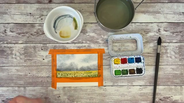 Résultat après séchage complet et retrait du sel, révélant les textures créées par les cristaux de sel sur le mélange jaune-vert du sol