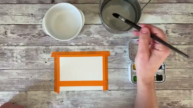 Présentation du pinceau à lavis et préparation du papier avec de l'eau, montrant le matériel utilisé