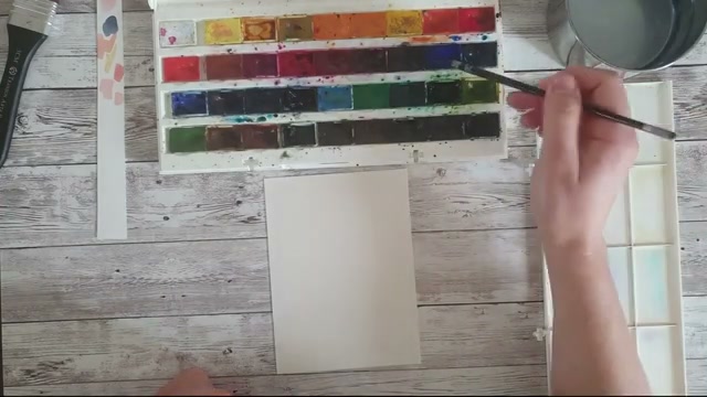 Démonstration en direct de la réserve de blanc : l'artiste peint un ciel au pinceau en mouillé sur mouillé, laissant délibérément certaines zones du papier vierges pour créer des formes de nuages