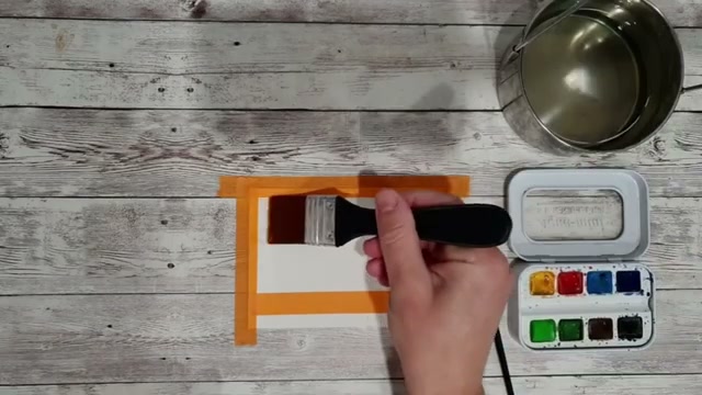 Présentation du matériel avec la brosse plate utilisée pour humidifier la feuille, scotch visible délimitant la composition sur le papier aquarelle